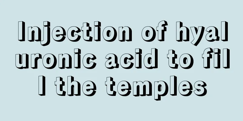 Injection of hyaluronic acid to fill the temples