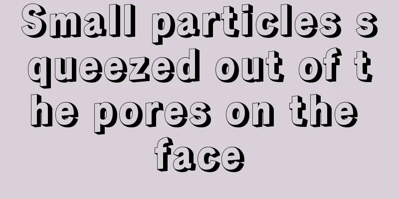 Small particles squeezed out of the pores on the face