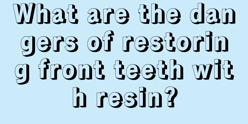 What are the dangers of restoring front teeth with resin?