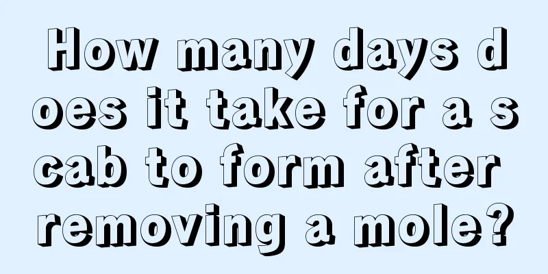 How many days does it take for a scab to form after removing a mole?