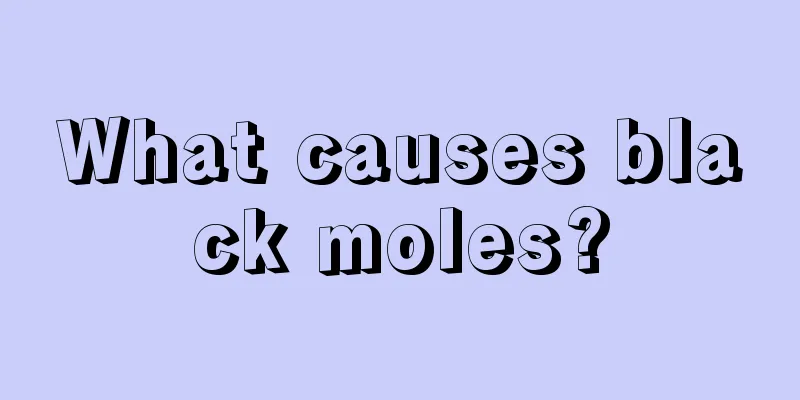 What causes black moles?