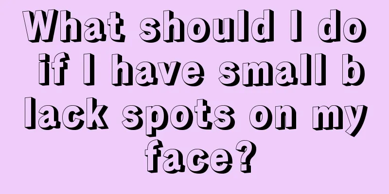 What should I do if I have small black spots on my face?